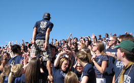 Student riling up the Aggie Pack!